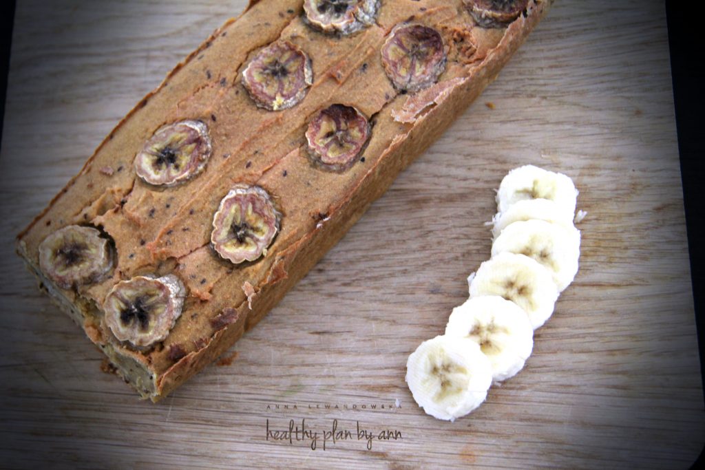 Gluten free banana and mango bread sliced on a board