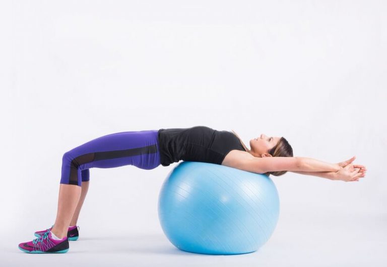 Back extended parallel to the floor with the shoulder blades on the ball